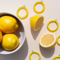 a bowl of lemons and a bowl of rings